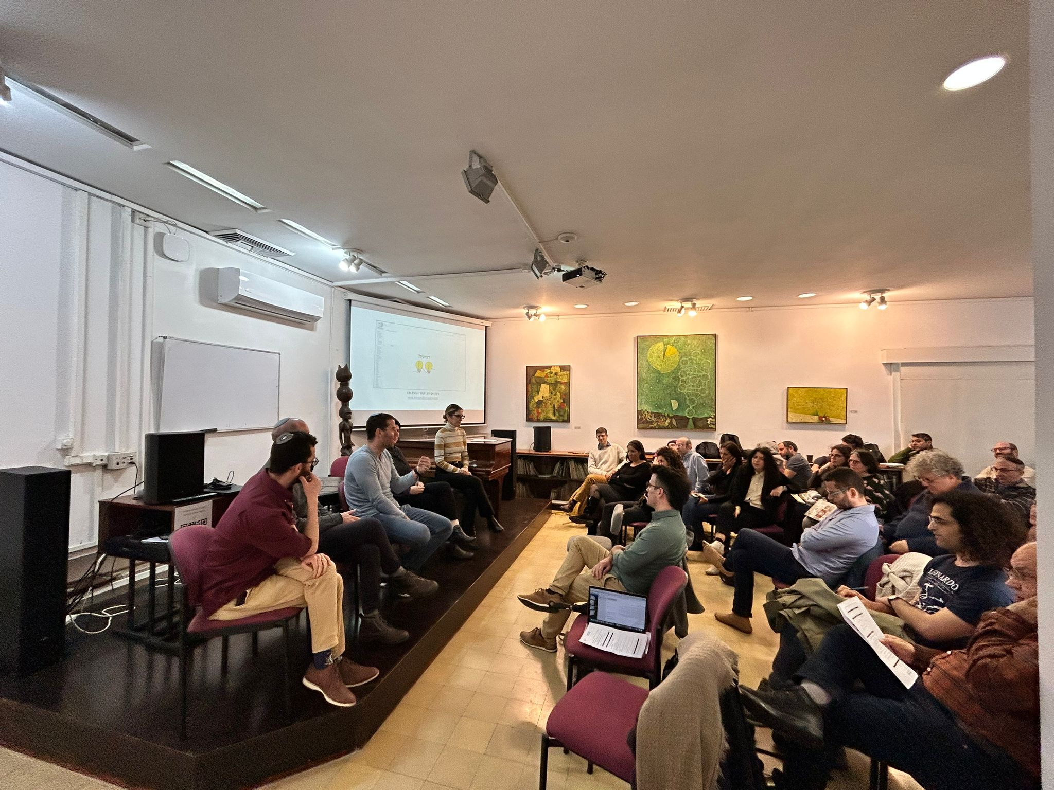 People sitting in a conference room